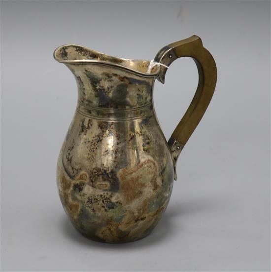 A 1930s Danish white metal milk jug, 7.5 oz.